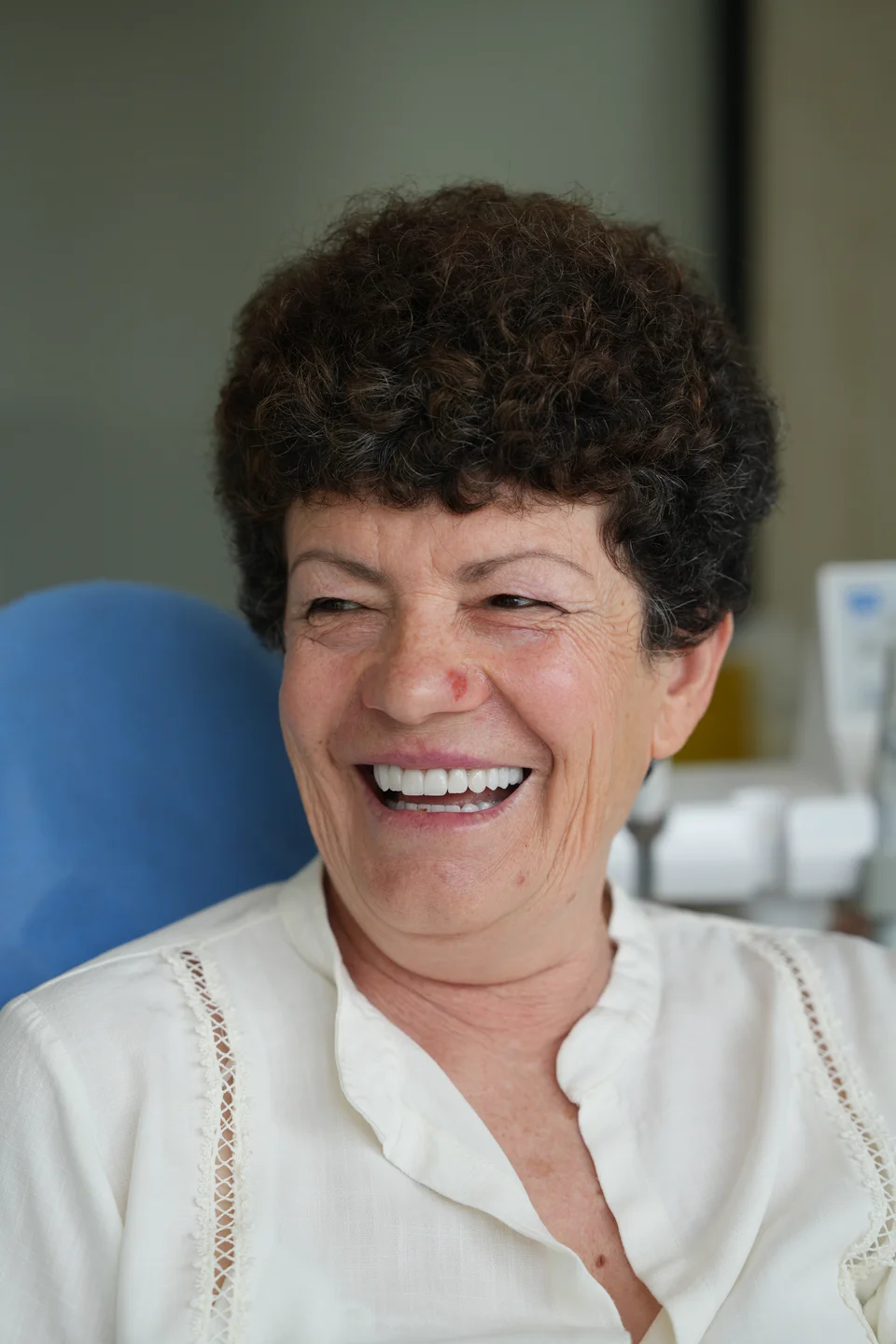 A happy patient at Dental Health Albania